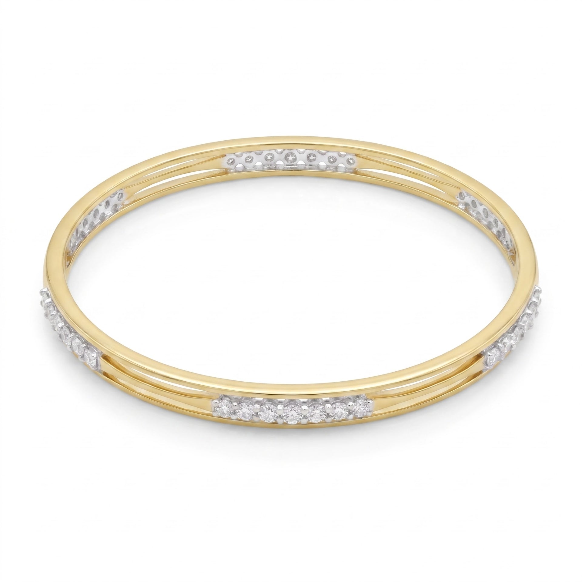 A yellow gold triple-band bangle bracelet with rows of small clear pavé stones set along the outer bands, shown on a plain white background.