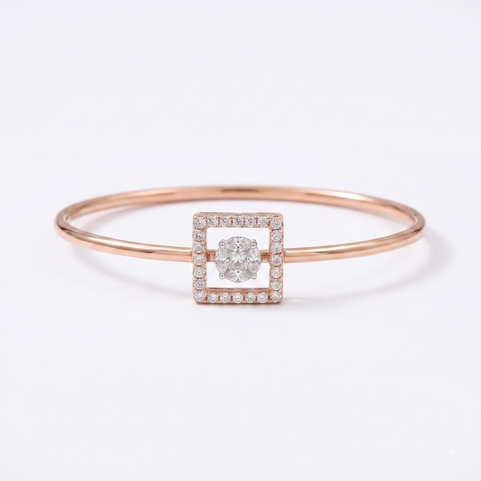 A rose gold bangle bracelet featuring a square-shaped centerpiece with a central round diamond surrounded by a halo of small pavé diamonds, set against a clean white background.