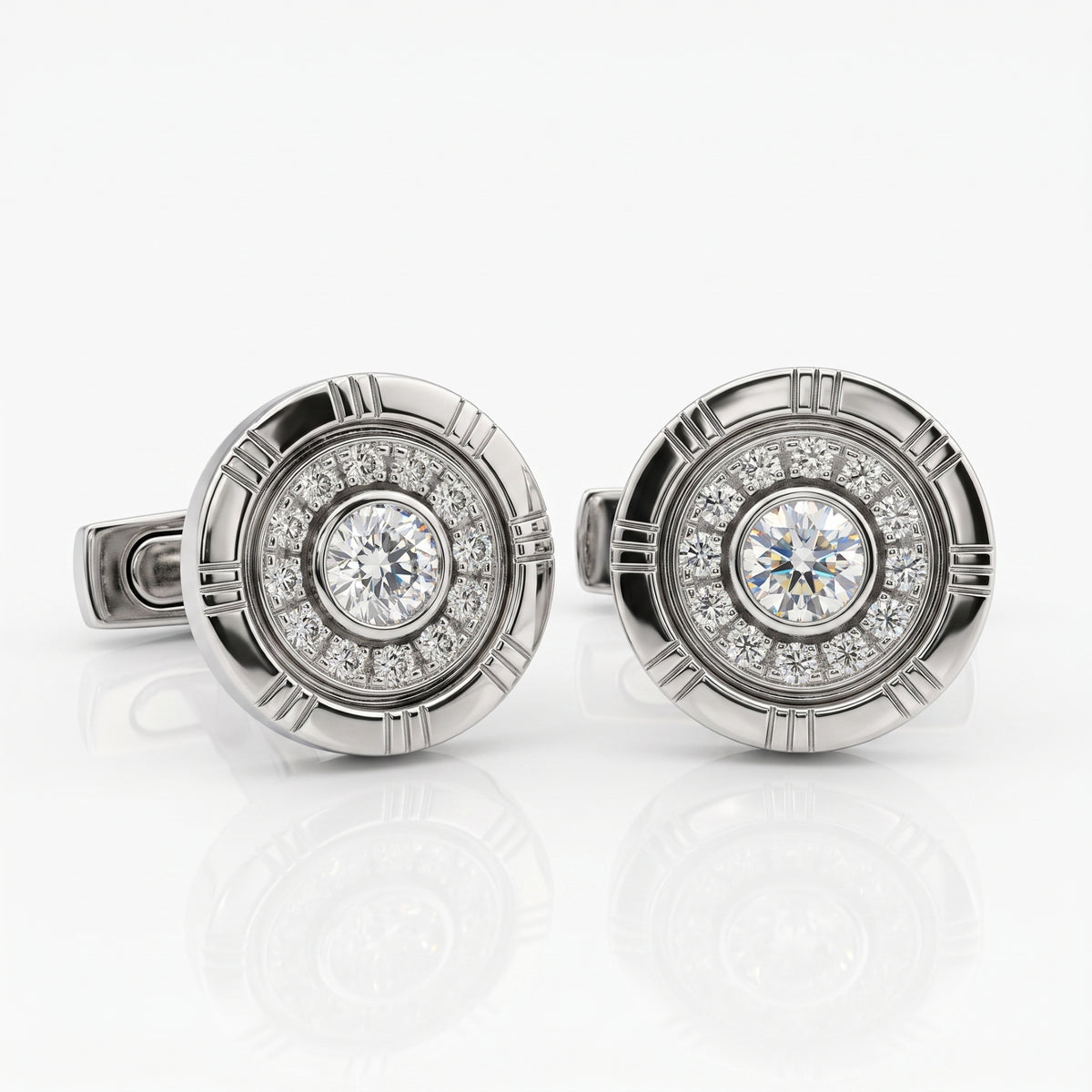 A pair of round silver-toned cufflinks featuring a central round diamond surrounded by a halo of smaller diamonds, set in a circular textured bezel.