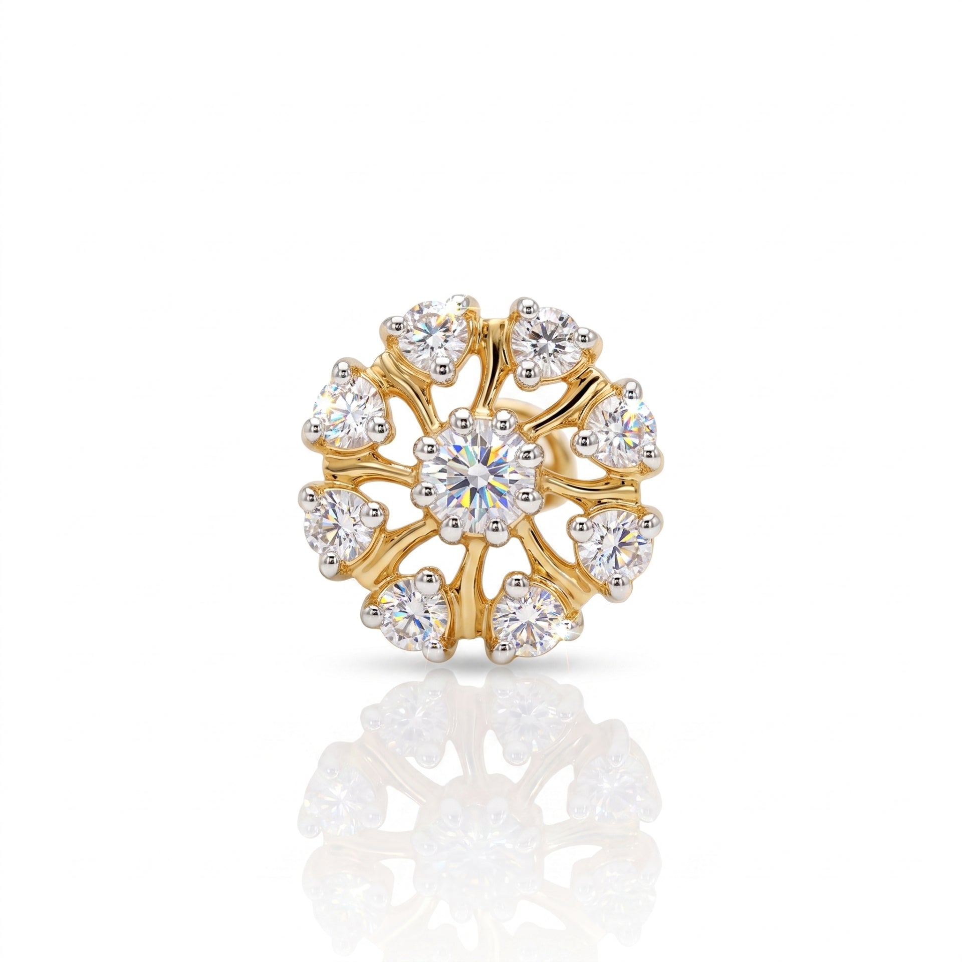A gold flower-shaped ring with a central round brilliant-cut diamond and surrounding smaller round and heart-shaped diamonds, displayed on a clean white background with a soft reflection below.