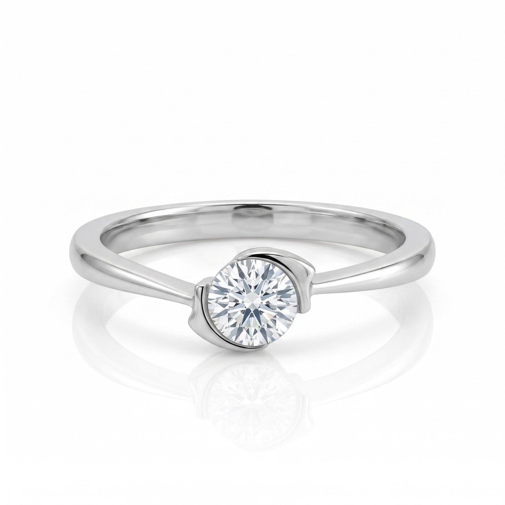 Silver ring with a diamond on a white background