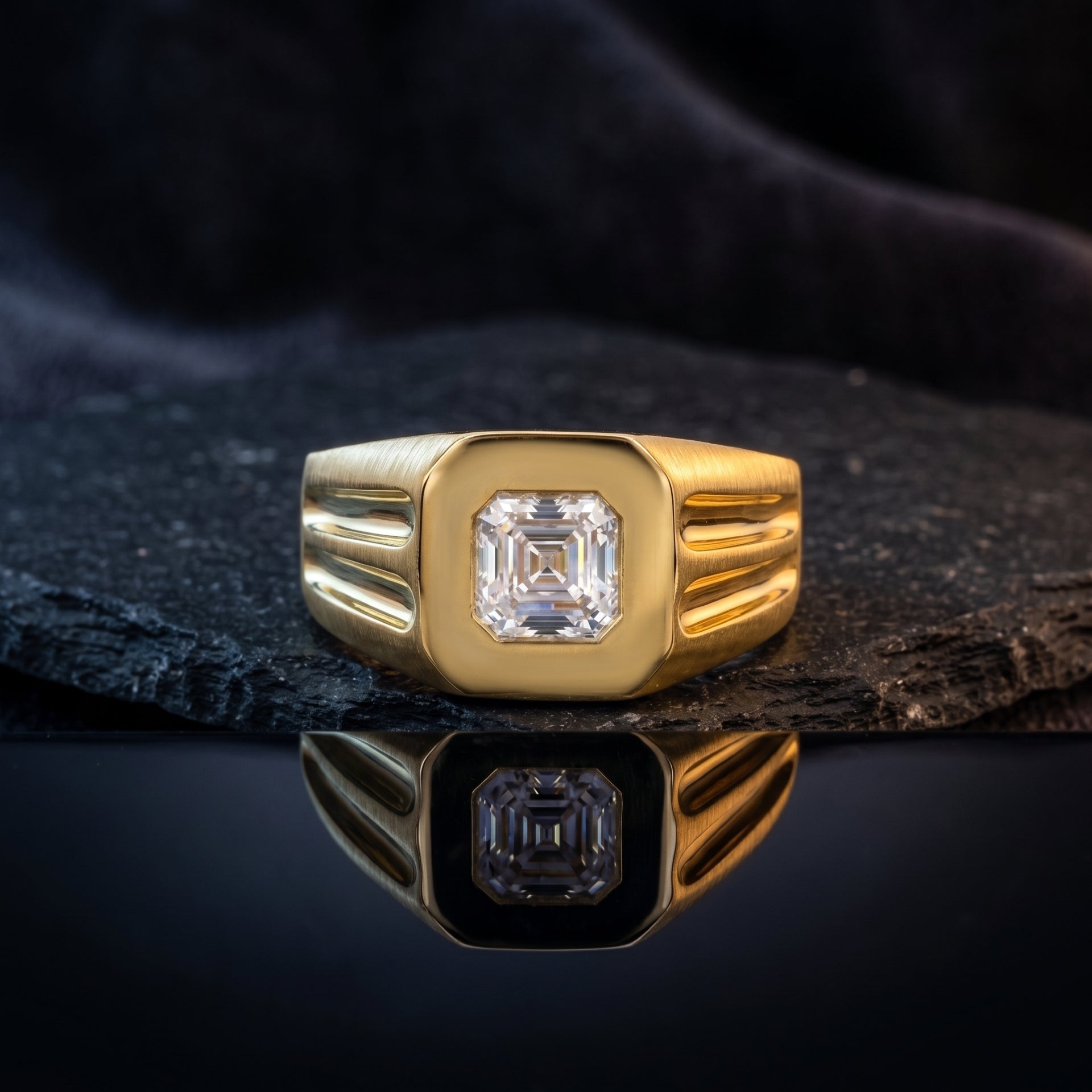 Gold ring with a diamond on a dark surface
