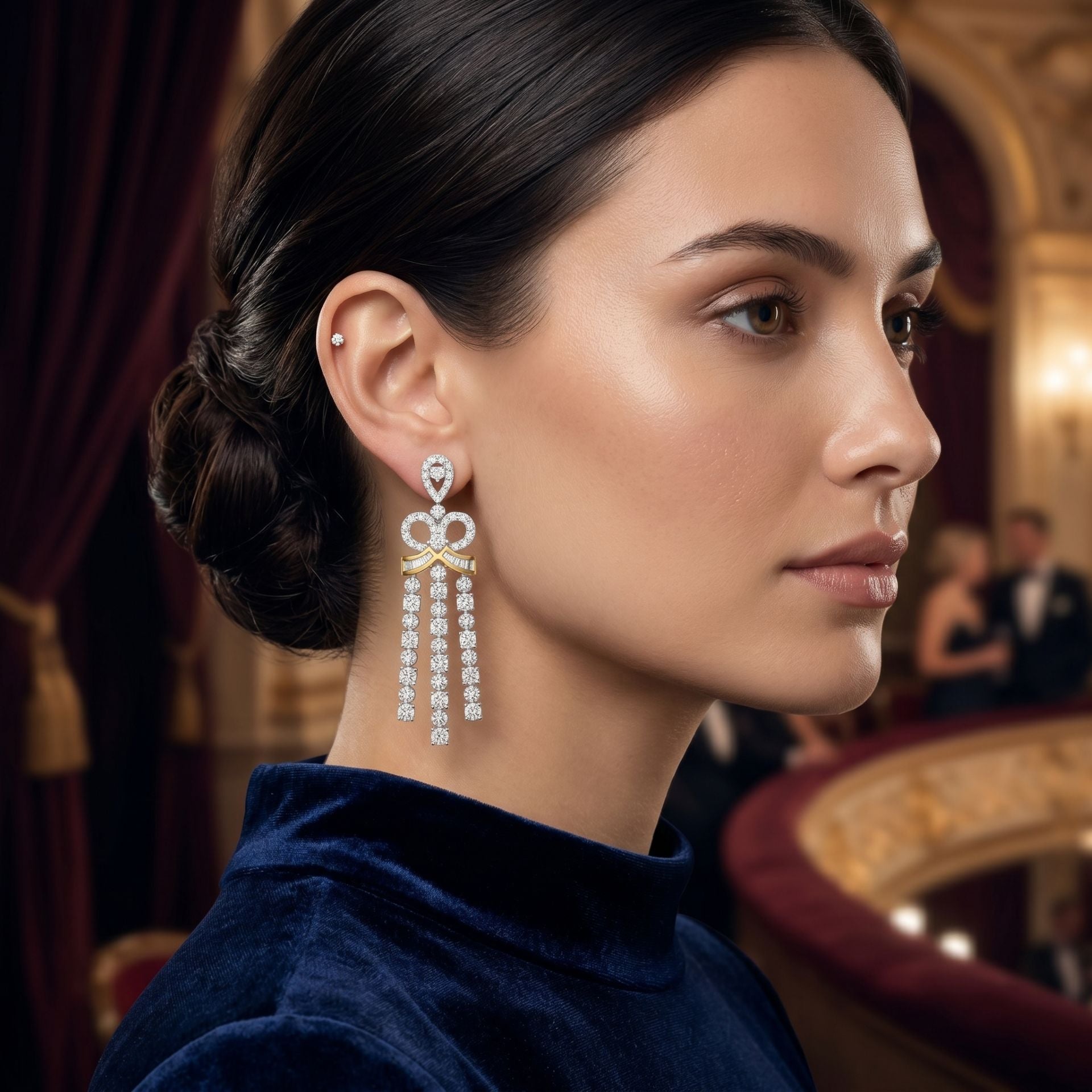 Woman wearing a diamond earring in an elegant indoor setting