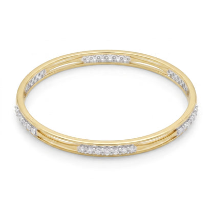 A yellow gold triple-band bangle bracelet with rows of small clear pavé stones set along the outer bands, shown on a plain white background.