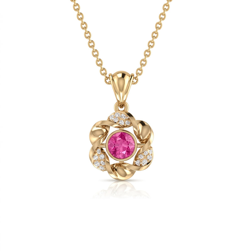 A gold pendant necklace featuring a central round pink gemstone surrounded by a floral arrangement of small clear stones and polished gold leaves, suspended from a delicate gold chain on a white background.