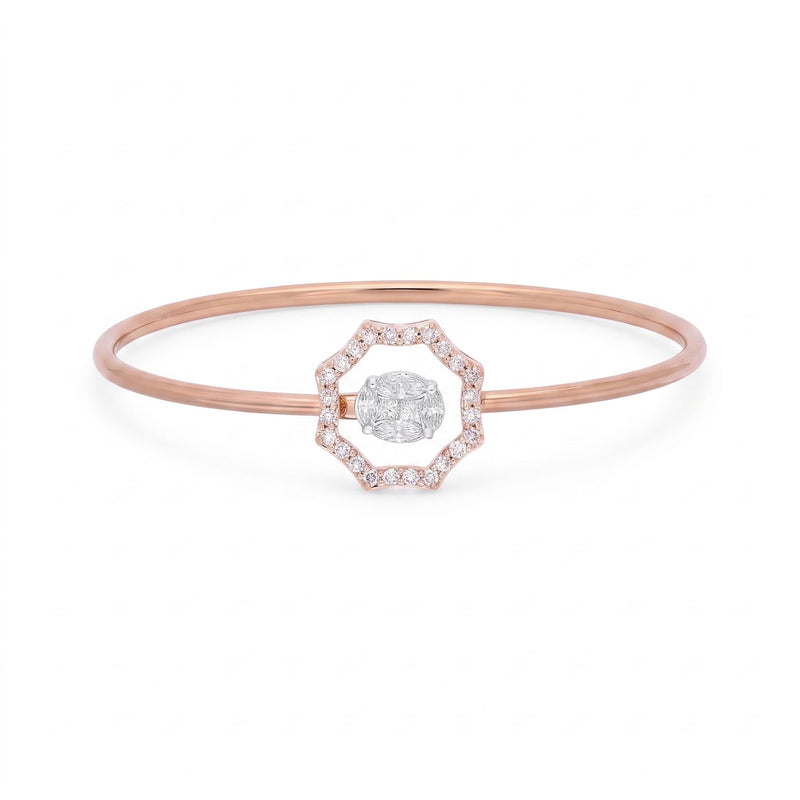 A delicate rose gold bangle bracelet featuring a central geometric octagonal halo set with small clear stones and a round-cut center stone, shown on a clean white background.