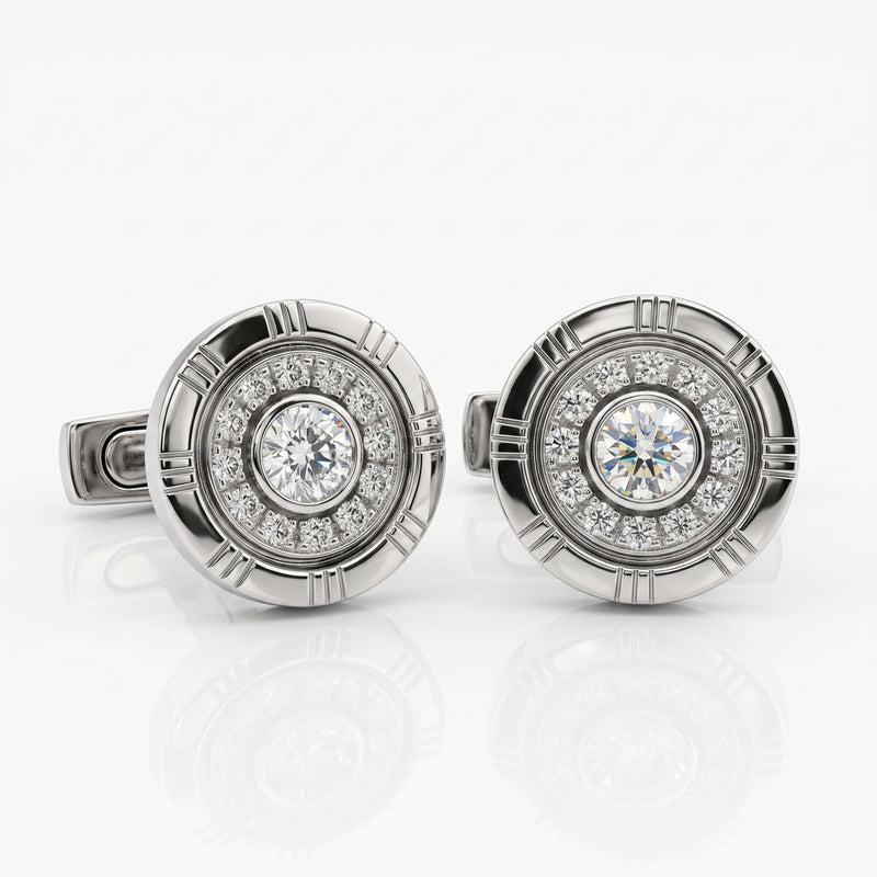 A pair of round silver-toned cufflinks featuring a central round diamond surrounded by a halo of smaller diamonds, set in a circular textured bezel.