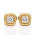 A pair of gold square stud earrings with cushion-cut clear gemstones, displayed on a reflective white surface.