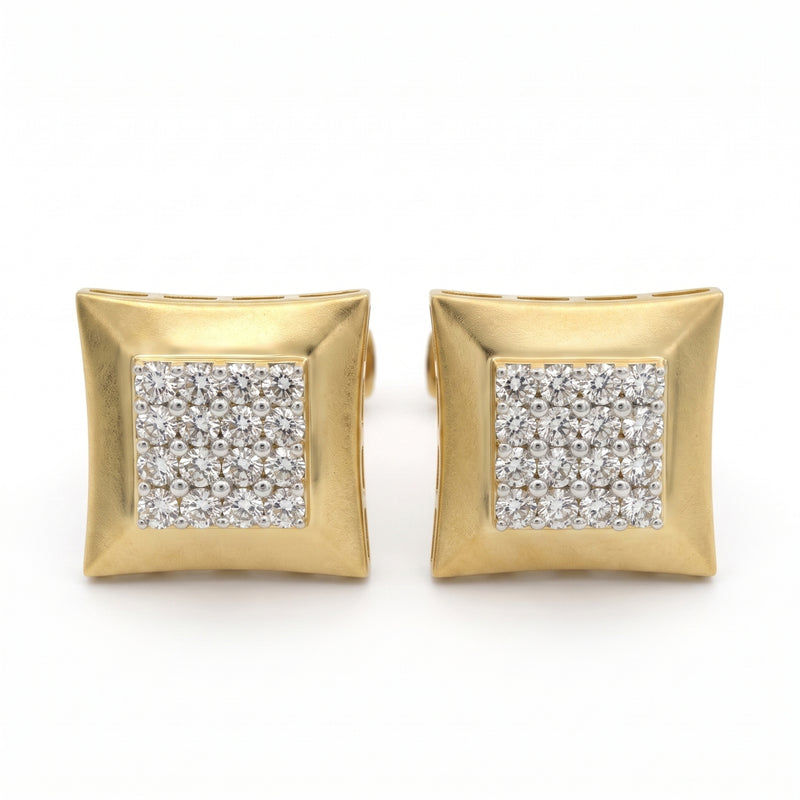 A pair of gold square stud earrings with a pavé diamond center, shown on a plain white background.