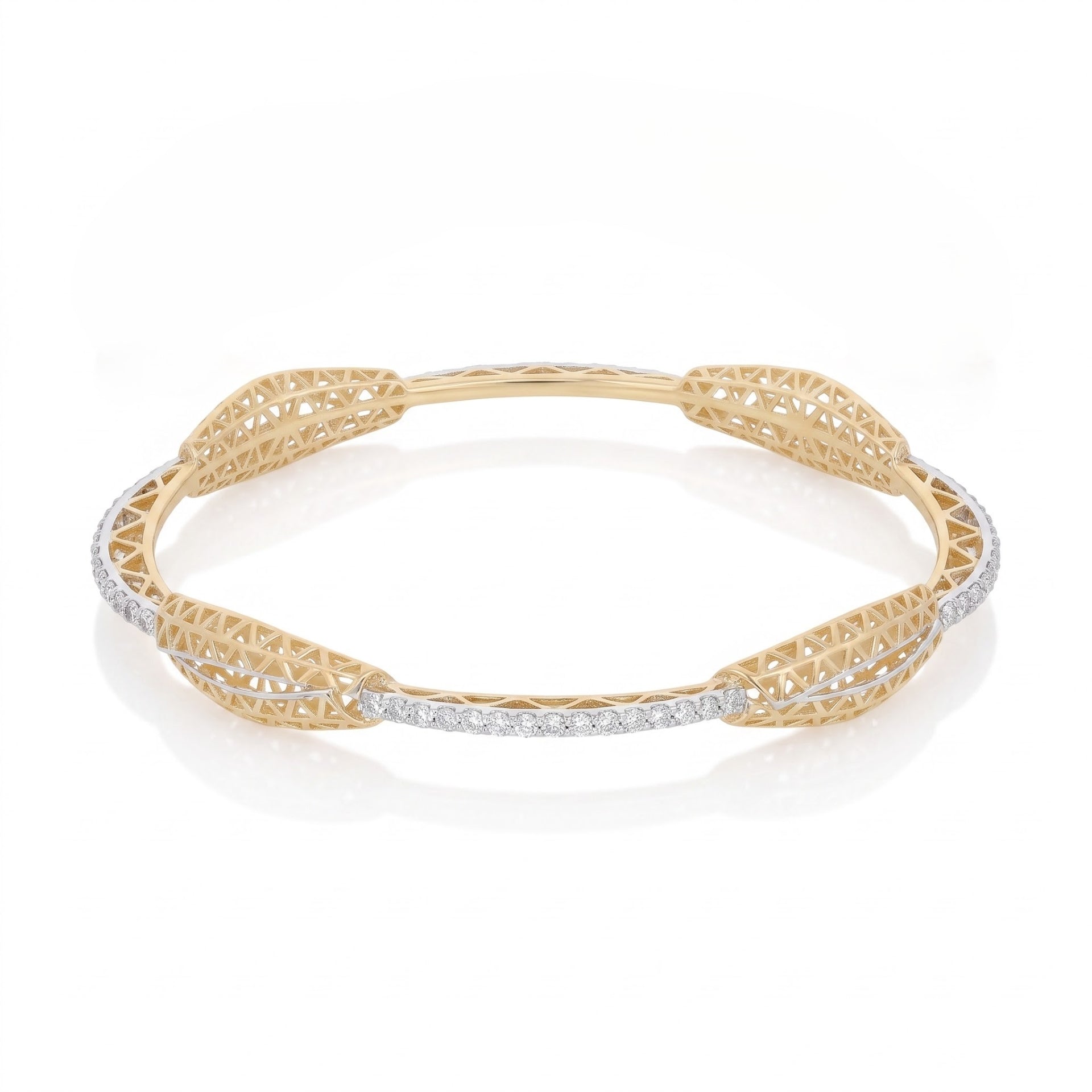 A yellow gold filigree bangle bracelet with a row of small clear stones along the front, displayed on a clean white background.