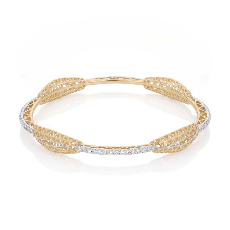 A yellow gold filigree bangle bracelet with a row of small clear stones along the front, displayed on a clean white background.