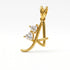 A gold initial pendant featuring the letter &