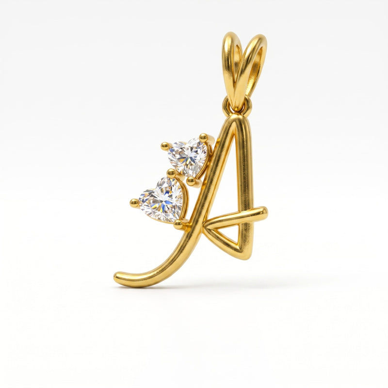 A gold initial pendant featuring the letter &