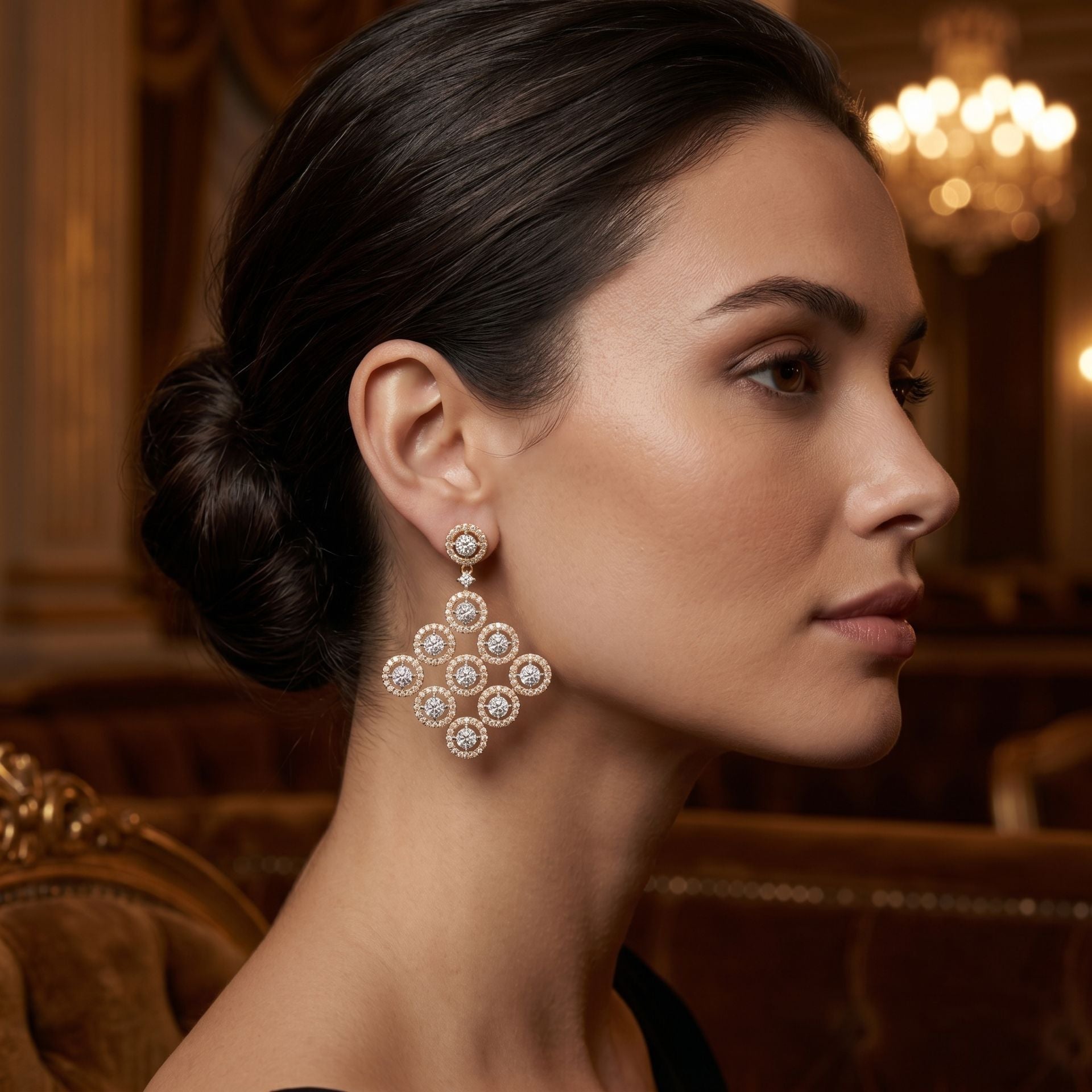 Woman wearing elegant teardrop lab-grown diamond earrings in a sophisticated indoor portrait.