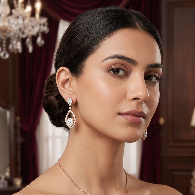 Woman wearing elegant earrings in a luxurious setting
