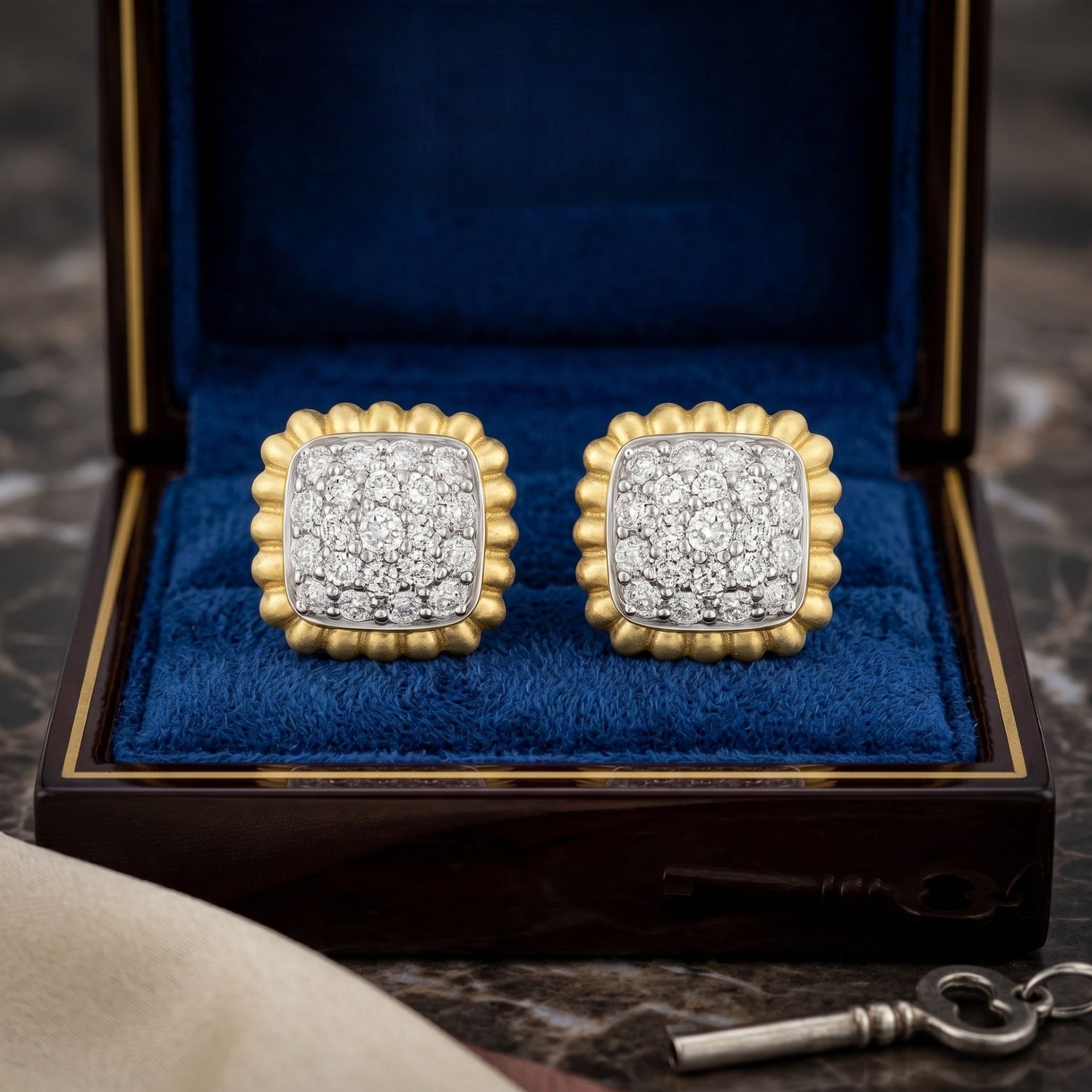 Square lab grown diamond stud earrings in a blue velvet jewellery box