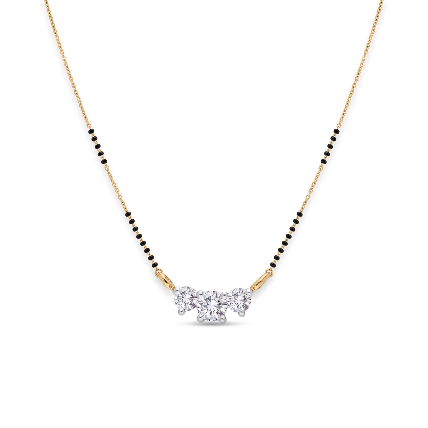 A delicate gold chain necklace with a black bead line and a central cluster of clear gemstones, shown on a plain white background.