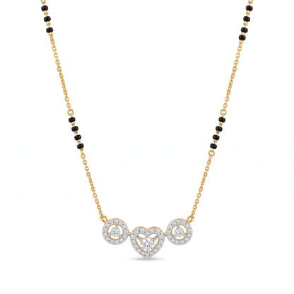 A delicate gold chain necklace featuring a central pendant with a heart and two circular motifs, all set with clear stones, accented by small black beads along the chain, on a plain white background.
