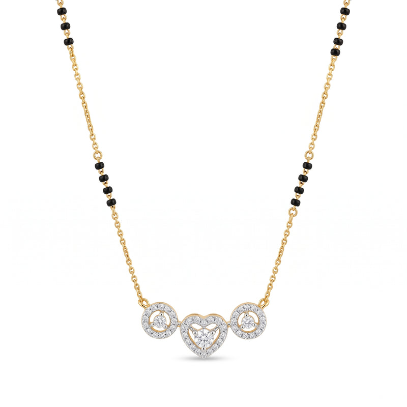 A delicate gold chain necklace featuring a central pendant with a heart and two circular motifs, all set with clear stones, accented by small black beads along the chain, on a plain white background.