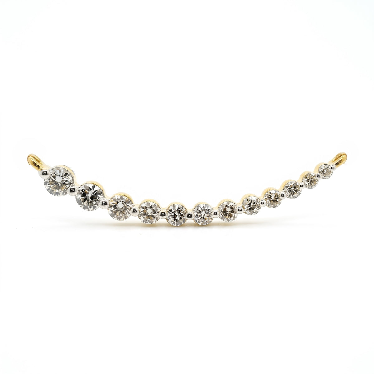 A delicate curved tennis bracelet featuring alternating round-cut clear gemstones in white metal and yellow gold settings, displayed against a solid white background.