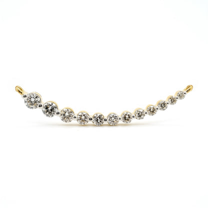 A delicate curved tennis bracelet featuring alternating round-cut clear gemstones in white metal and yellow gold settings, displayed against a solid white background.