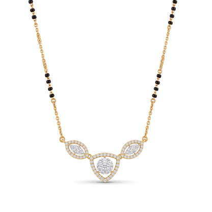 A gold and black beaded necklace with a central pendant featuring three teardrop-shaped clusters of small clear stones, set against a plain white background.