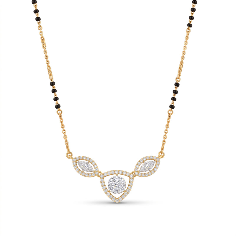 A gold and black beaded necklace with a central pendant featuring three teardrop-shaped clusters of small clear stones, set against a plain white background.