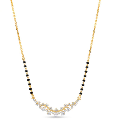 A gold chain necklace featuring a black bead line and a V-shaped pendant adorned with small clear stones and a central diamond-cut stone, shown on a plain white background.