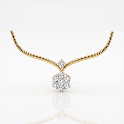 A delicate gold necklace with a curved wing-like design and a central cluster of clear gemstones, shown on a clean white background with a soft reflection below.
