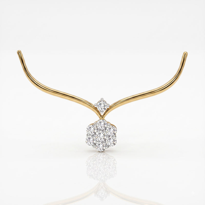 A delicate gold necklace with a curved wing-like design and a central cluster of clear gemstones, shown on a clean white background with a soft reflection below.