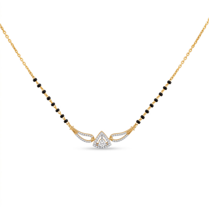 A gold chain necklace featuring a black bead-mannequin style design with a central gold and silver-toned winged pendant set with small clear stones, shown on a plain white background.