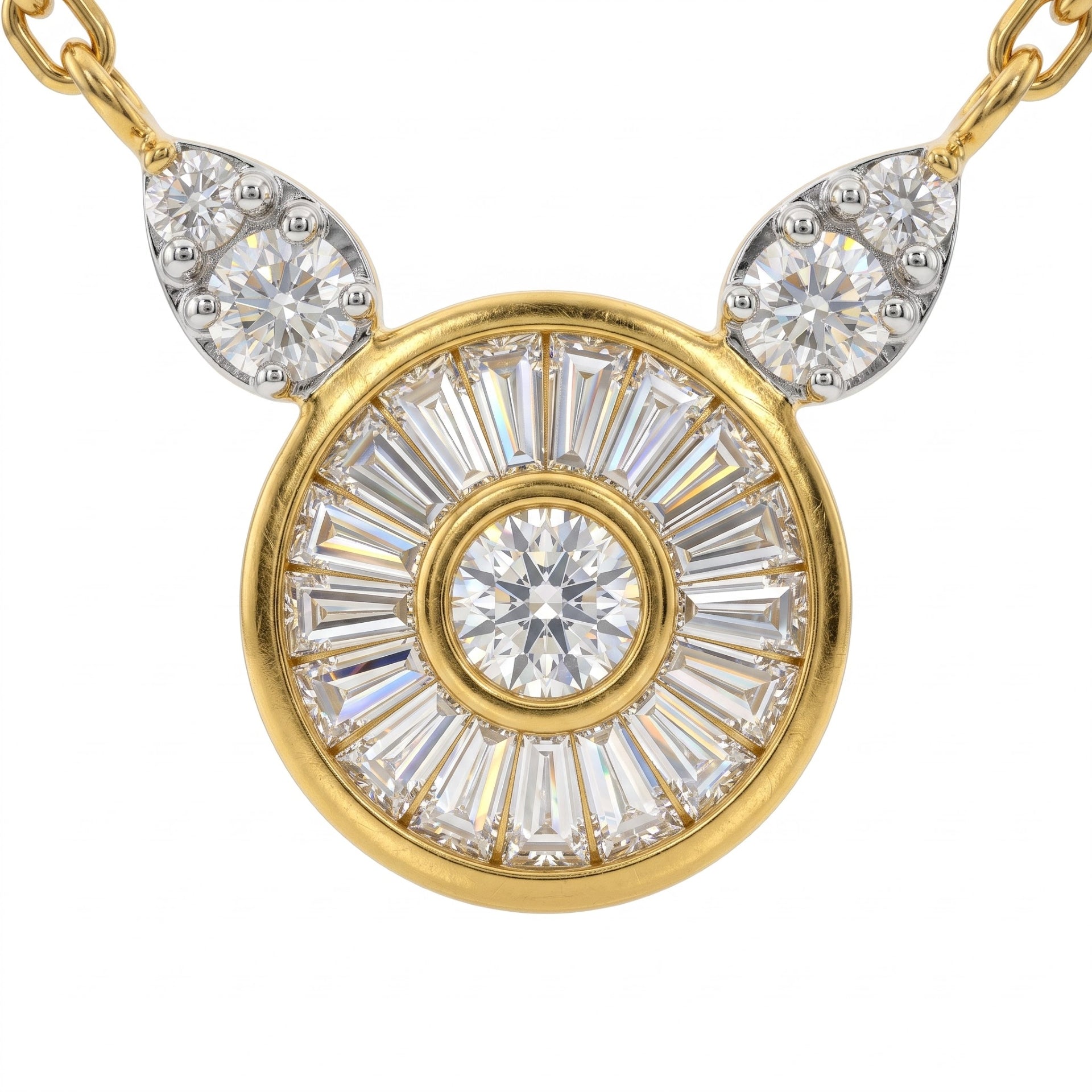 A yellow gold pendant necklace featuring a circular sunburst design with a central round diamond and baguette-cut diamonds, flanked by two teardrop-shaped diamond clusters on a white background.