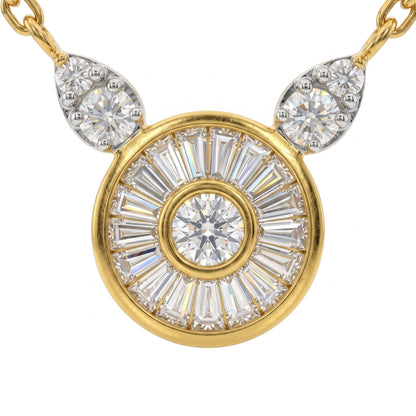 A yellow gold pendant necklace featuring a circular sunburst design with a central round diamond and baguette-cut diamonds, flanked by two teardrop-shaped diamond clusters on a white background.