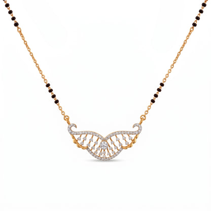 A gold and white stone necklace featuring a wing-like pavé pendant with a central clear stone, suspended from a chain with alternating gold and dark brown beads, on a white background.