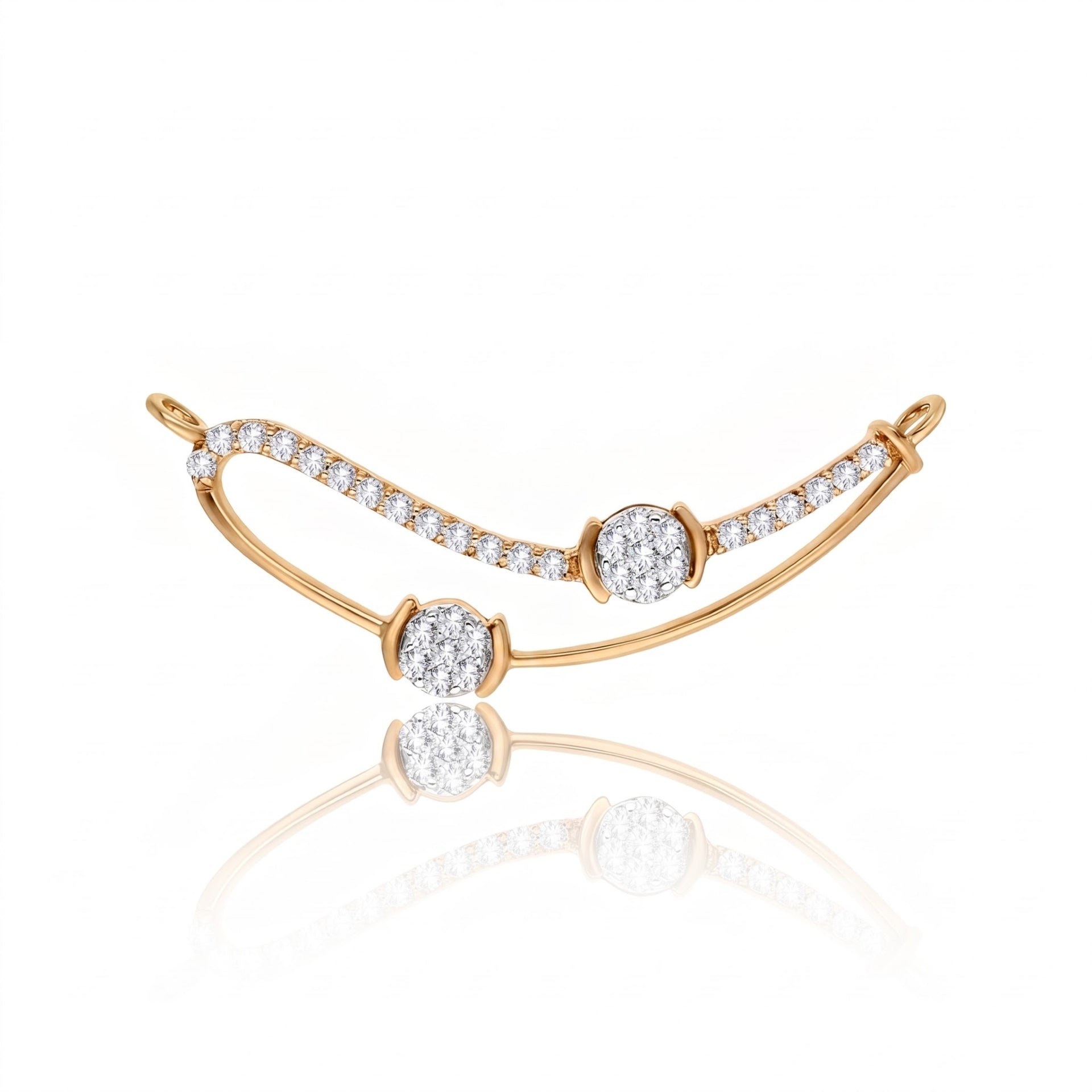 A gold crescent-shaped bracelet with pavé-set clear stones and three round-cut stones, displayed on a clean white background with a soft reflection below.