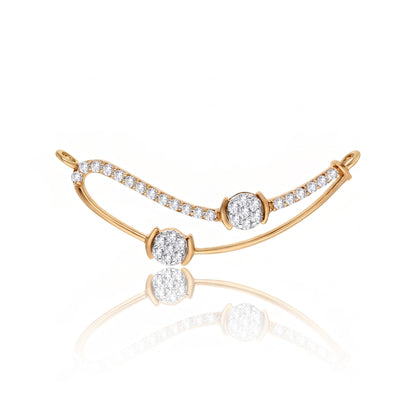 A gold crescent-shaped bracelet with pavé-set clear stones and three round-cut stones, displayed on a clean white background with a soft reflection below.