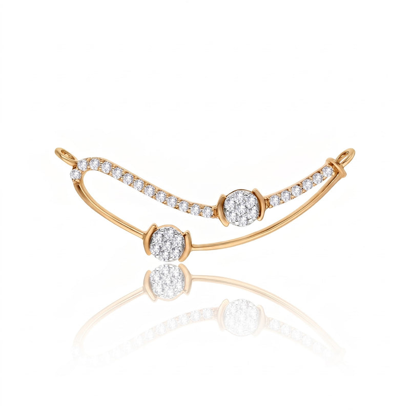 A gold crescent-shaped bracelet with pavé-set clear stones and three round-cut stones, displayed on a clean white background with a soft reflection below.