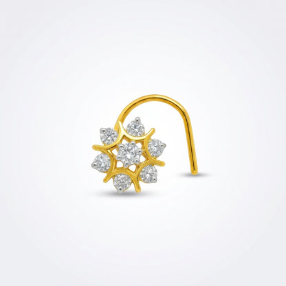 A gold crescent-shaped nose hoop nose ring with a central cluster of clear gemstones in a floral or snowflake-like arrangement, shown on a light gray background.