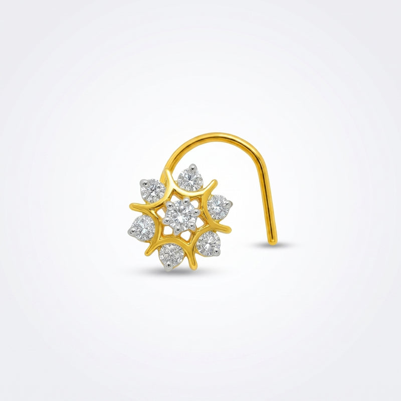A gold crescent-shaped nose hoop nose ring with a central cluster of clear gemstones in a floral or snowflake-like arrangement, shown on a light gray background.