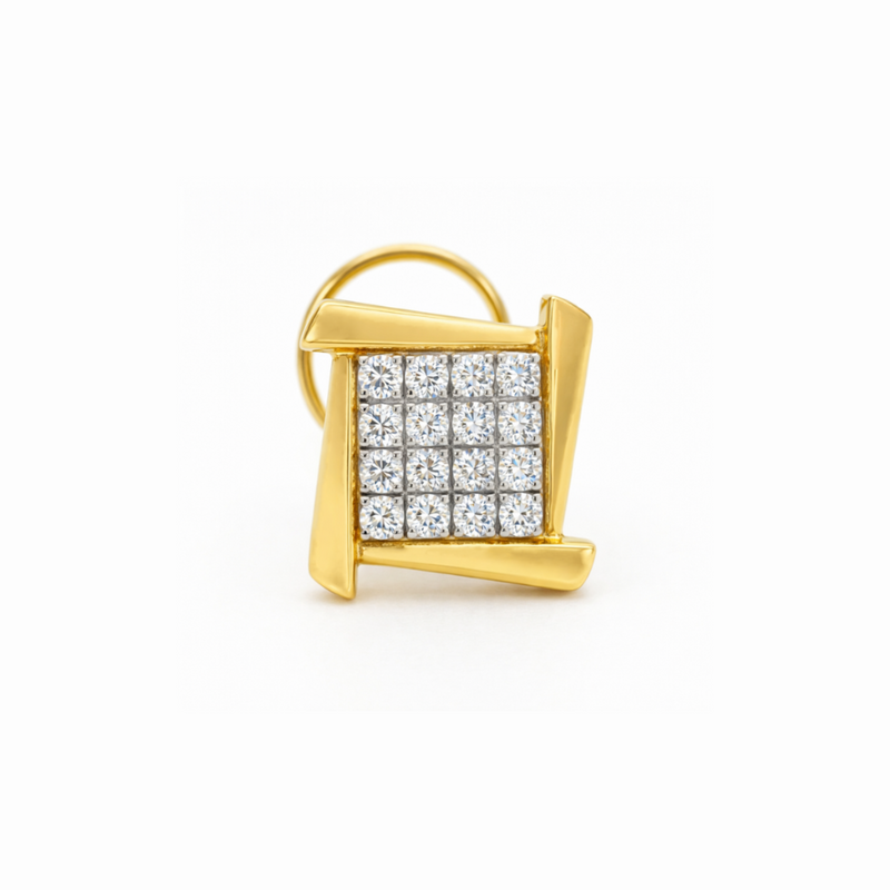 A gold geometric ring featuring a square face paved with small clear stones, set against a plain white background.