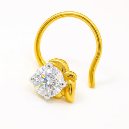 A gold nose hoop nose ring with a round brilliant-cut clear gemstone in a prong setting, shown on a clean white background.