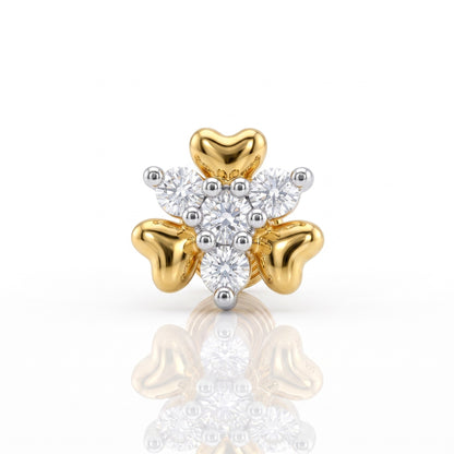 A three-leaf clover-shaped ring featuring polished yellow gold leaves and a central cluster of round-cut white diamonds, shown on a clean white background with a soft reflection below.