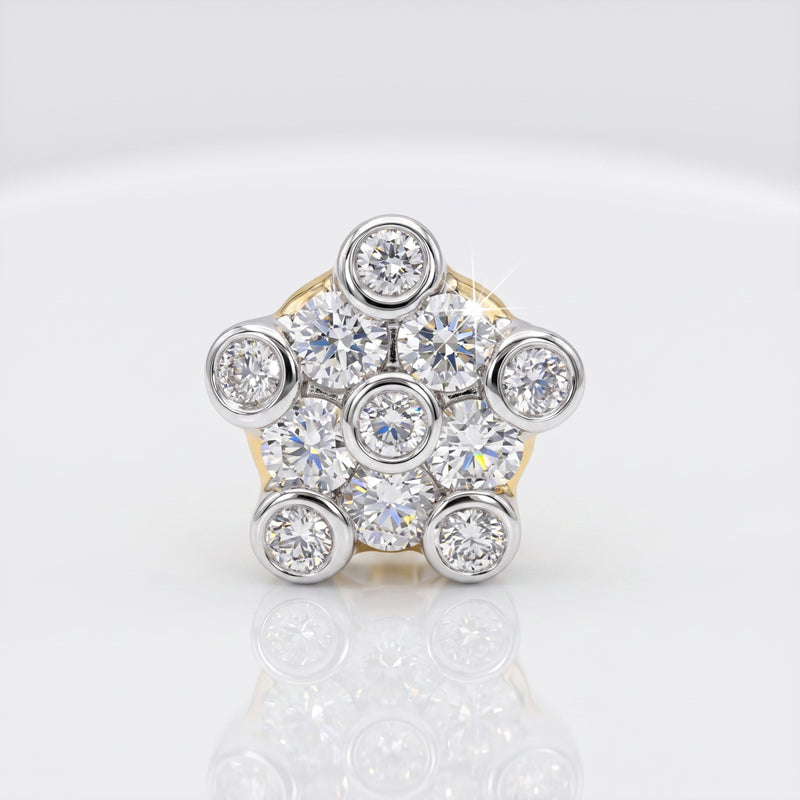 A cluster nosepin featuring multiple round brilliant-cut diamonds set in a silver-toned metal with a hint of yellow gold on the band, shown on a reflective white surface.