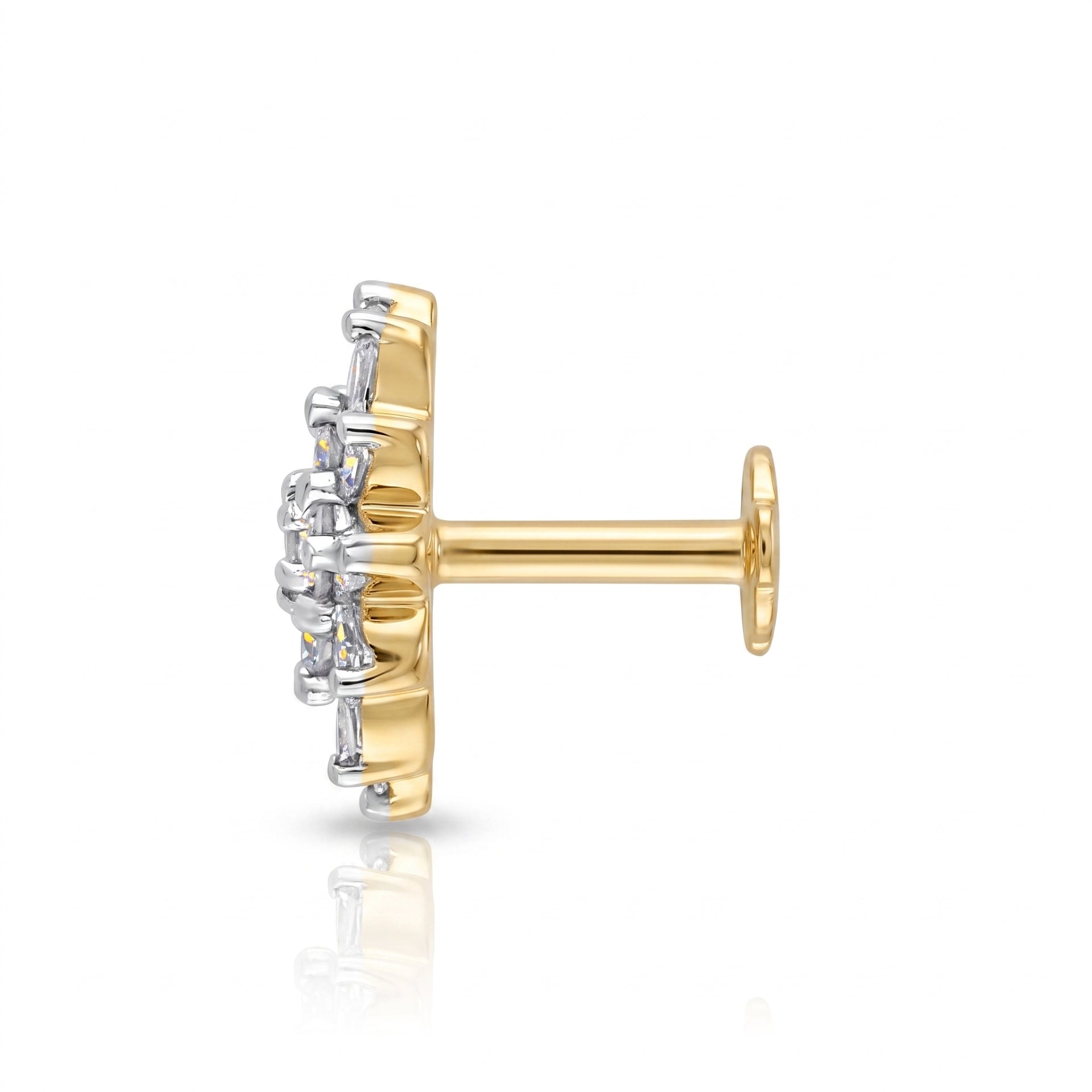Side view of a  single gold and white gold stud nose pin shown from the side on a clean white background with a soft reflection below.