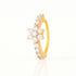 A yellow gold ring featuring a central flower cluster of clear round-cut stones and a curved row of small clear stones along the band, shown on a clean white background.