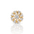 A gold flower-shaped ring with a central round brilliant-cut diamond and surrounding smaller round and heart-shaped diamonds, displayed on a clean white background with a soft reflection below.