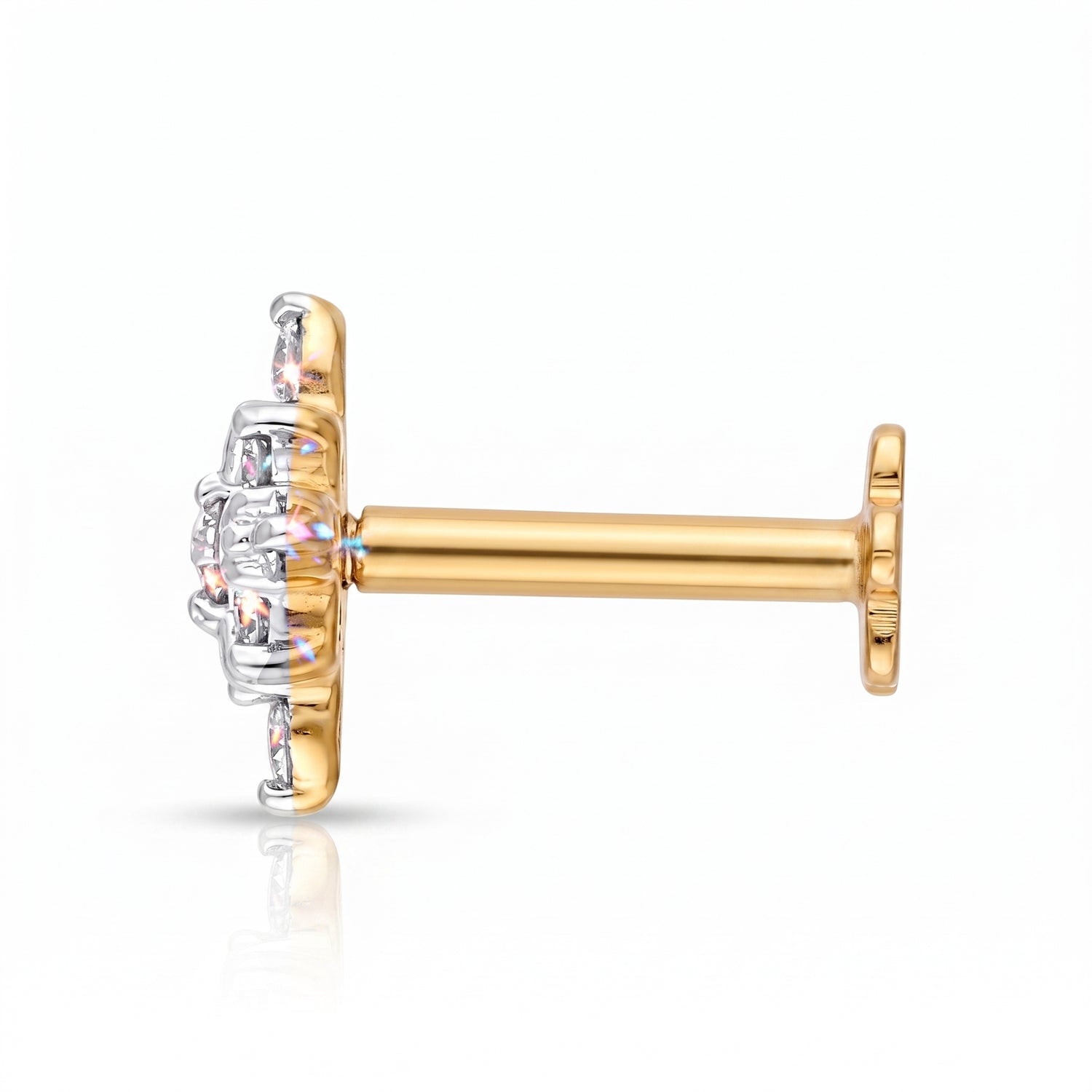 A single gold and silver stud earring with a clear gemstone cluster, shown from a side profile view on a white background.