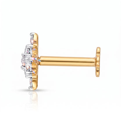 A single gold and silver stud earring with a clear gemstone cluster, shown from a side profile view on a white background.