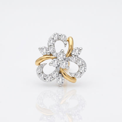 A two-tone yellow gold and white gold flower-shaped ring set with numerous clear round-cut diamonds, photographed on a clean white background with a soft reflection below.