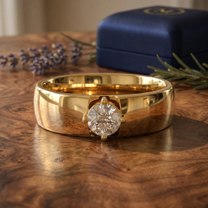 Gold ring with a diamond on a wooden surface with a blue box and lavender flowers in the background.